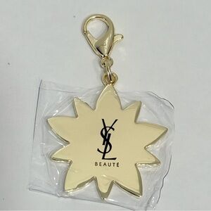 Yves Saint Laurent Beaute Gold Flower bag Charm keychain
